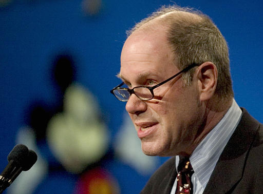 Michael Eisner, CEO and Chairman of The Walt Disney World Company, looks over his glasses while discussing the earnings report at the Walt Disney World Investors Conference 2004 at the Walt Disney World Resort in Lake Buena Vista, Florida, February 11, 2004.